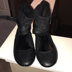 Black suede and faux leather flats